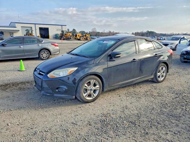 FORD FOCUS SE 2014 with VIN 1FADP3F26EL147703 - Photo from auction