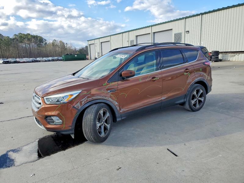 FORD ESCAPE 2017 with VIN 1FMCU0G99HUB36309 - Photo from auction