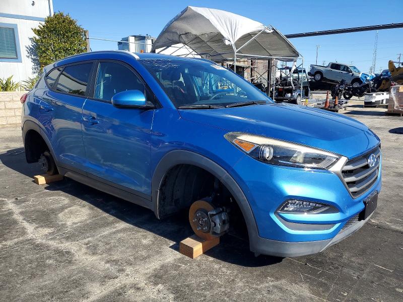 Photo 4 from auction – 2016 HYUNDAI TUCSON LIM with VIN KM8J33A43GU239409