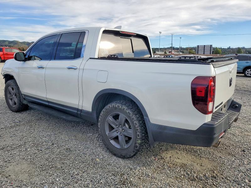 Photo 2 from auction – 2021 HONDA RIDGELINE with VIN 5FPYK3F79MB006574