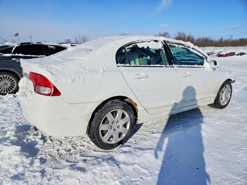 Photo 3 from auction – 2011 HONDA CIVIC with VIN 19XFA1F51BE031915