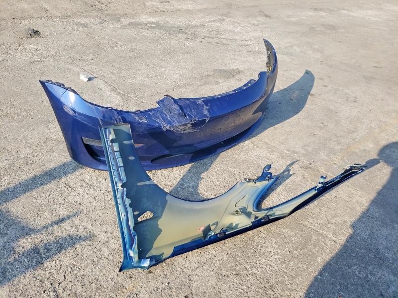 Photo 12 from auction – 2018 TESLA MODEL 3 with VIN 5YJ3E1EA1JF035896