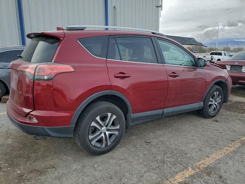 Photo 3 from auction – 2018 TOYOTA RAV4 LE with VIN 2T3ZFREV6JW501728