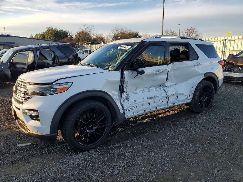 FORD EXPLORER 2021 with VIN 1FMSK8FH7MGB51490 - Photo from auction