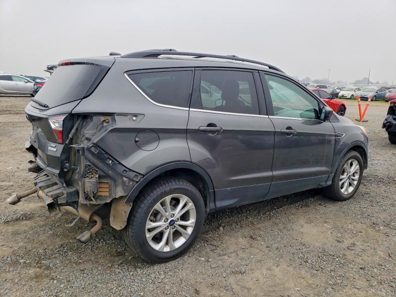 Photo 3 from auction – 2018 FORD ESCAPE SE with VIN 1FMCU9GD2JUA87341