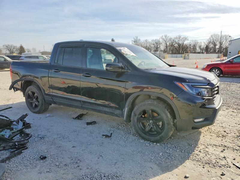 Photo 4 from auction – 2023 HONDA RIDGELINE with VIN 5FPYK3F88PB017790