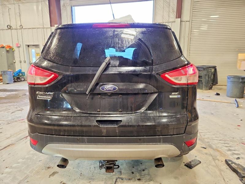 Photo 6 from auction – 2016 FORD ESCAPE SE with VIN 1FMCU9G91GUC63204