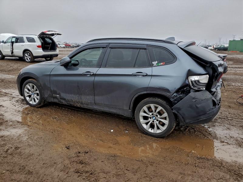 Photo 2 from auction – 2014 BMW X1 XDRIVE2 with VIN WBAVL1C54EVY11723