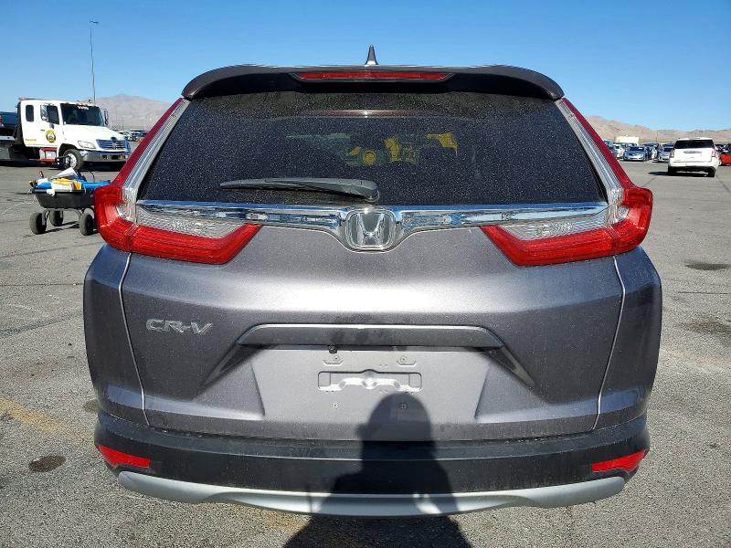 Photo 6 from auction – 2018 HONDA CR-V with VIN 7FARW1H86JE021397