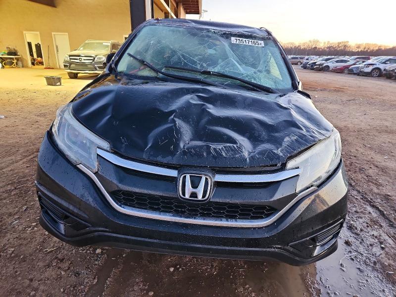 Photo 5 from auction – 2016 HONDA CR-V SE with VIN 2HKRM4H41GH677520