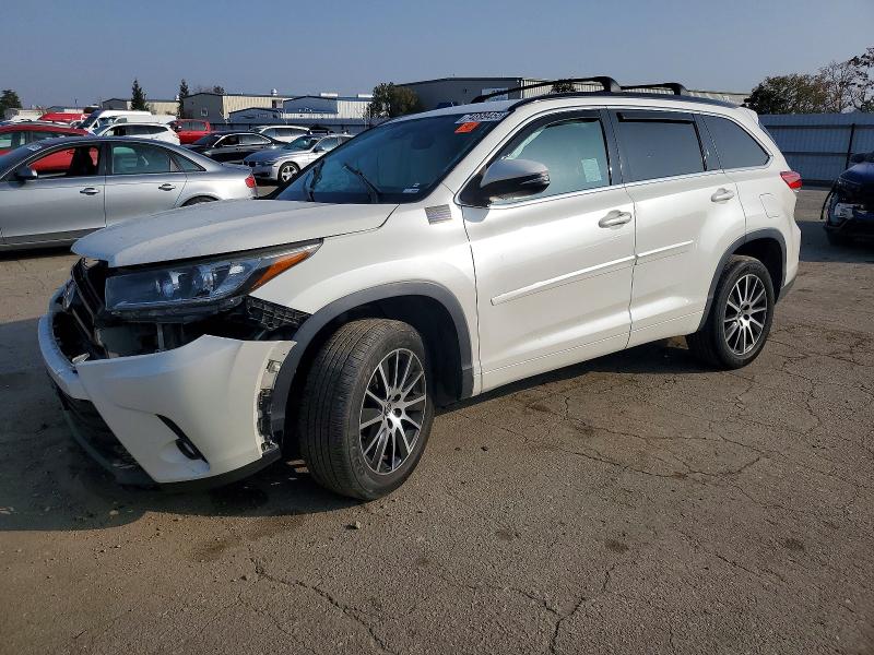 TOYOTA HIGHLANDER 2018 with VIN 5TDKZRFH5JS549210 - Photo from auction