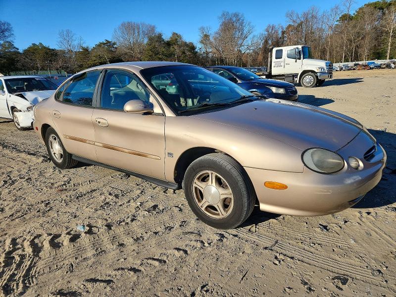 Photo 4 from auction – 1999 FORD TAURUS SE with VIN 1FAFP53S2XA165283