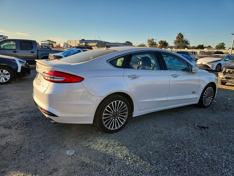 Photo 3 from auction – 2018 FORD FUSION with VIN 3FA6P0SU0JR110351