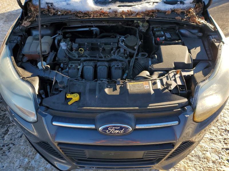 Photo 11 from auction – 2014 FORD FOCUS SE with VIN 1FADP3F22EL226981