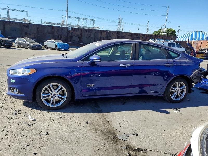 FORD FUSION TIT 2016 with VIN 3FA6P0SU5GR304589 - Photo from auction