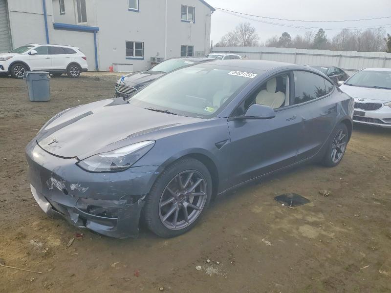 TESLA MODEL 3 2023 with VIN 5YJ3E1EA2PF618602 - Photo from auction