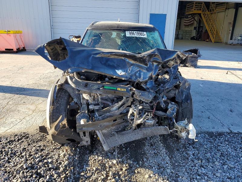 Photo 5 from auction – 2010 MINI COOPER CLU with VIN WMWML3C54ATX38849