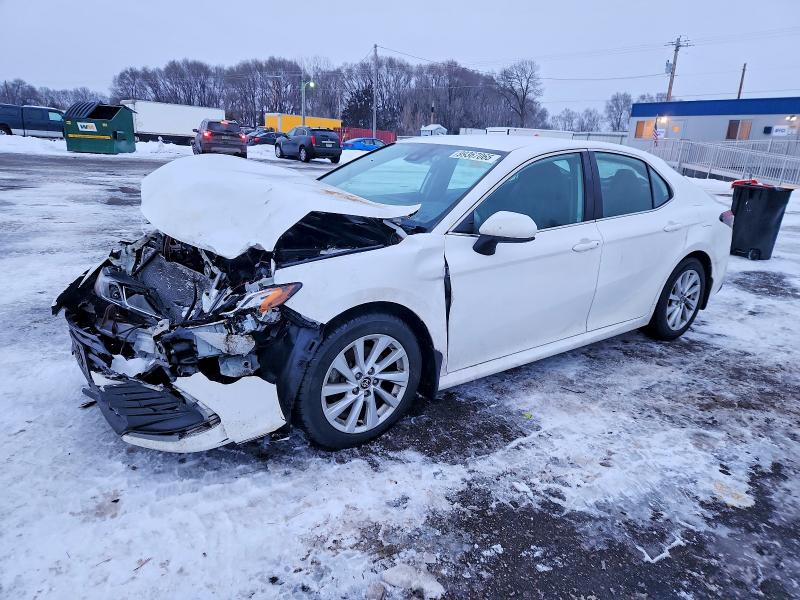 TOYOTA CAMRY LE 2022 with VIN 4T1C11AK7NU650293 - Photo from auction