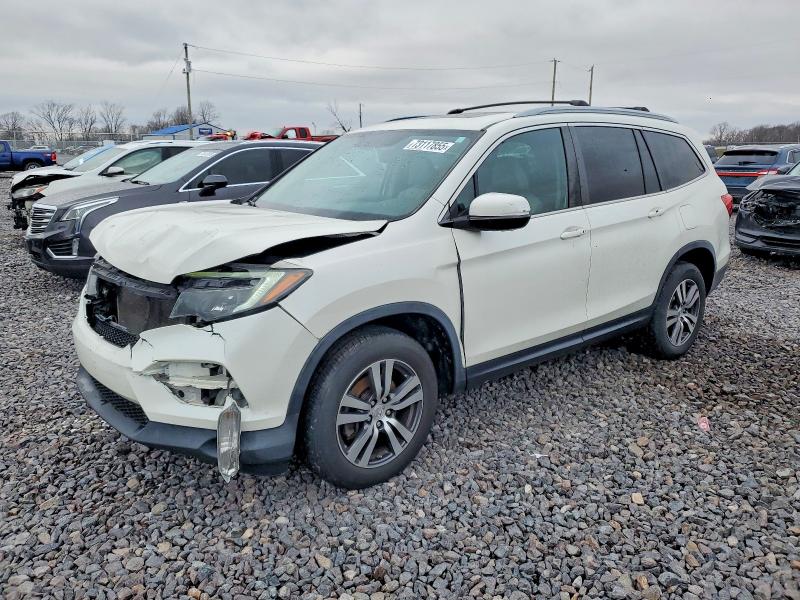 HONDA PILOT EXL 2016 with VIN 5FNYF6H8XGB083415 - Photo from auction