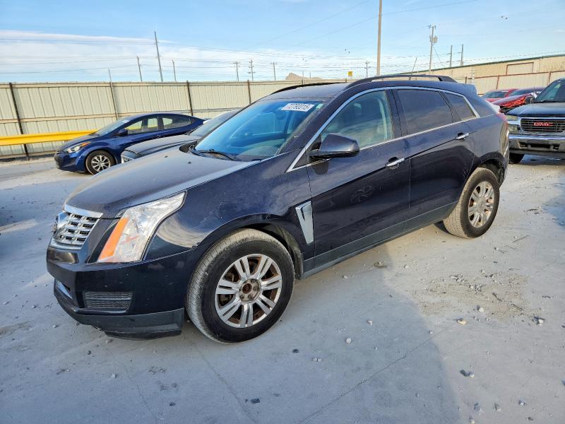 CADILLAC SRX 2014 with VIN 3GYFNAE35ES558697 - Photo from auction