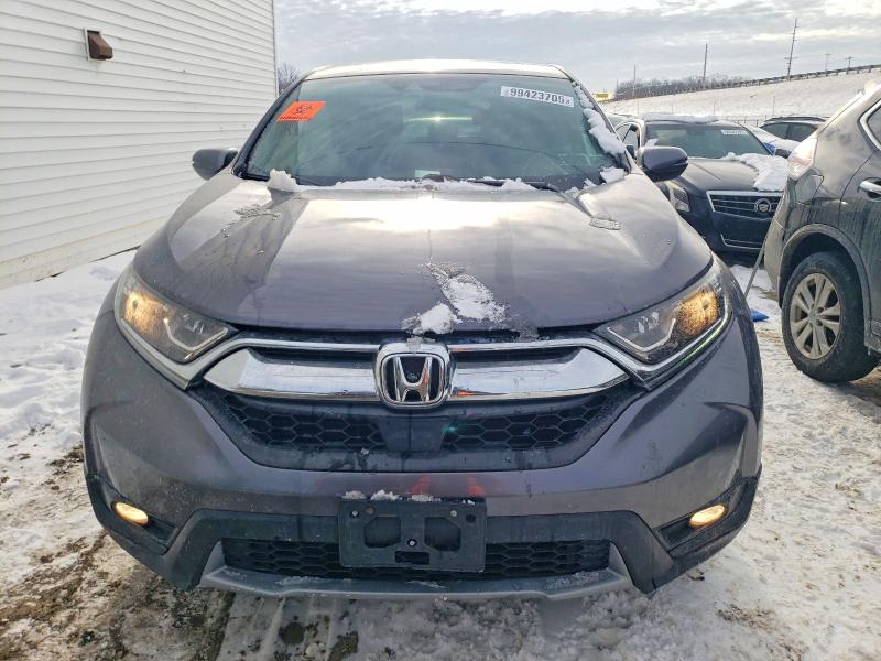 Photo 5 from auction – 2018 HONDA CR-V EX with VIN 7FARW2H55JE047422