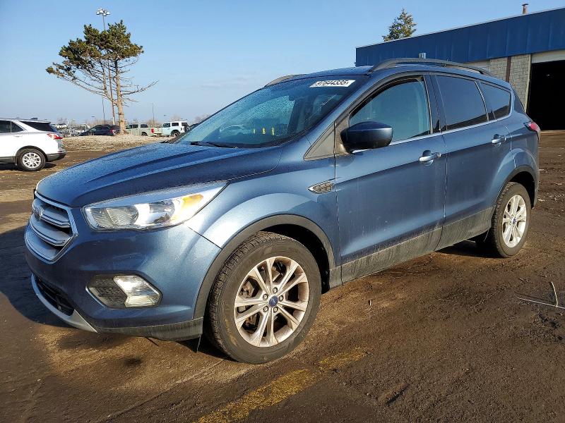 FORD ESCAPE 2018 with VIN 1FMCU0GD0JUA52292 - Photo from auction