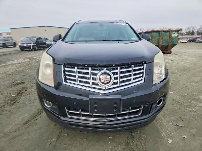 Photo 5 from auction – 2013 CADILLAC SRX PERFOR with VIN 3GYFNHE33DS511076
