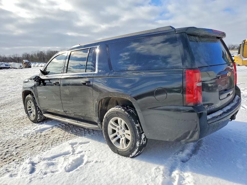 Photo 2 from auction – 2016 CHEVROLET SUBURBAN with VIN 1GNSKHKCXGR100743