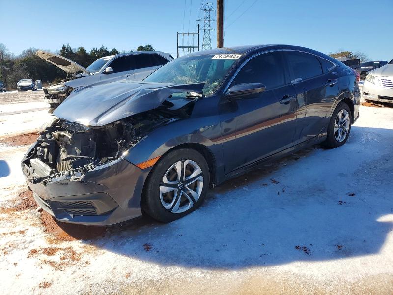 HONDA CIVIC LX 2017 with VIN 2HGFC2F55HH568916 - Photo from auction