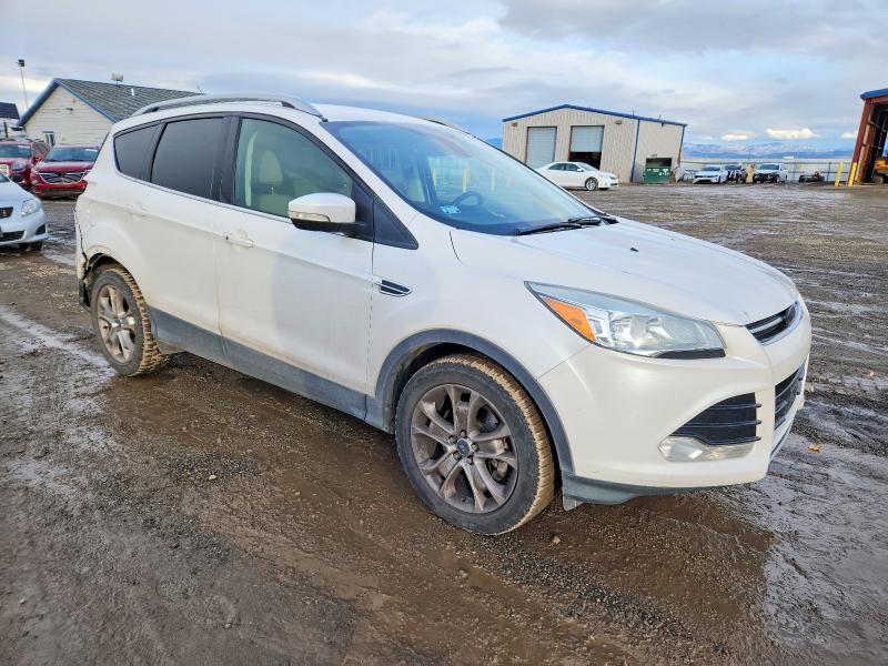 Photo 4 from auction – 2014 FORD ESCAPE TIT with VIN 1FMCU9J92EUE51235