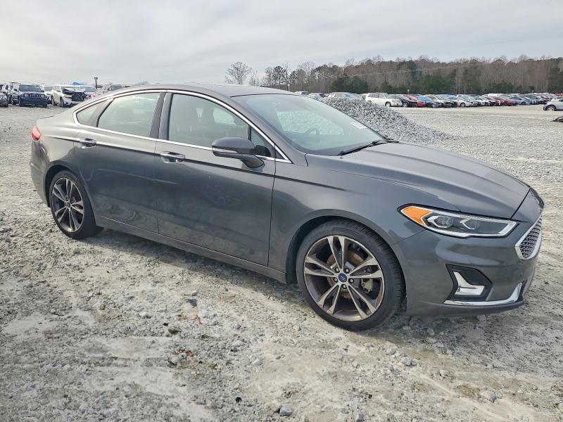 Photo 4 from auction – 2019 FORD FUSION TIT with VIN 3FA6P0K97KR193838