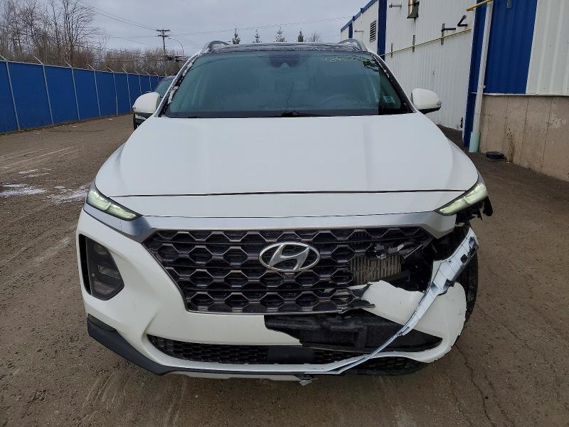 Photo 5 from auction – 2019 HYUNDAI SANTA FE with VIN 5NMS3CAA6KH079475