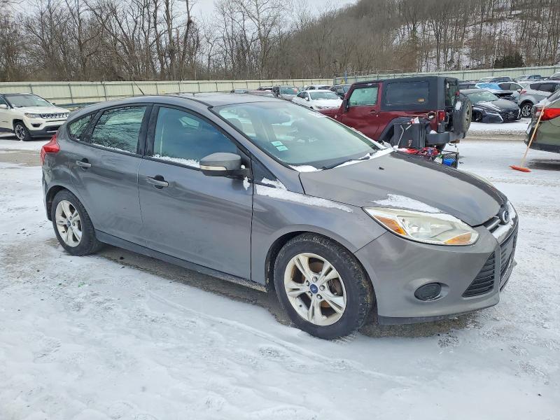 Foto 4 de la subasta – 2013 FORD FOCUS SE con VIN 1FADP3K21DL380490