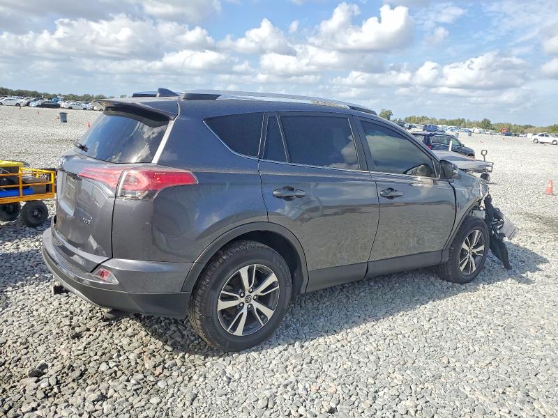 Photo 3 from auction – 2016 TOYOTA RAV4 XLE with VIN JTMWFREV6GJ063335