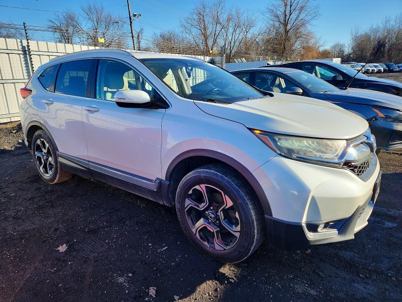 Photo 4 from auction – 2017 HONDA CR-V TOURI with VIN 2HKRW2H92HH602627