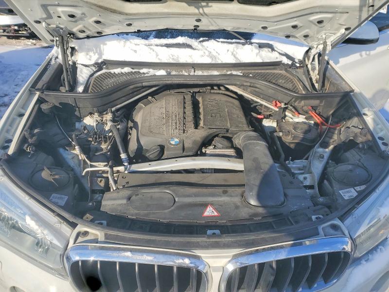 Photo 11 from auction – 2014 BMW X5 XDRIVE3 with VIN 5UXKR0C5XE0H22512