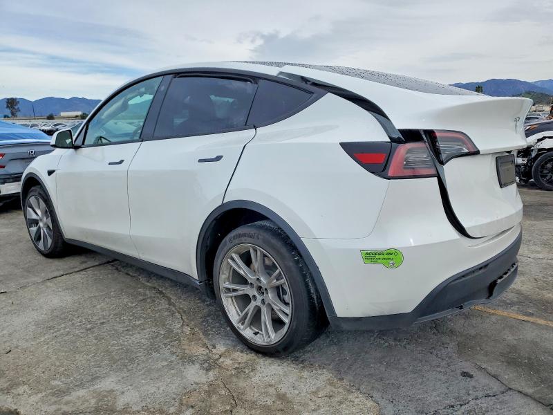 Photo 2 from auction – 2023 TESLA MODEL Y with VIN 7SAYGDEE6PF738118