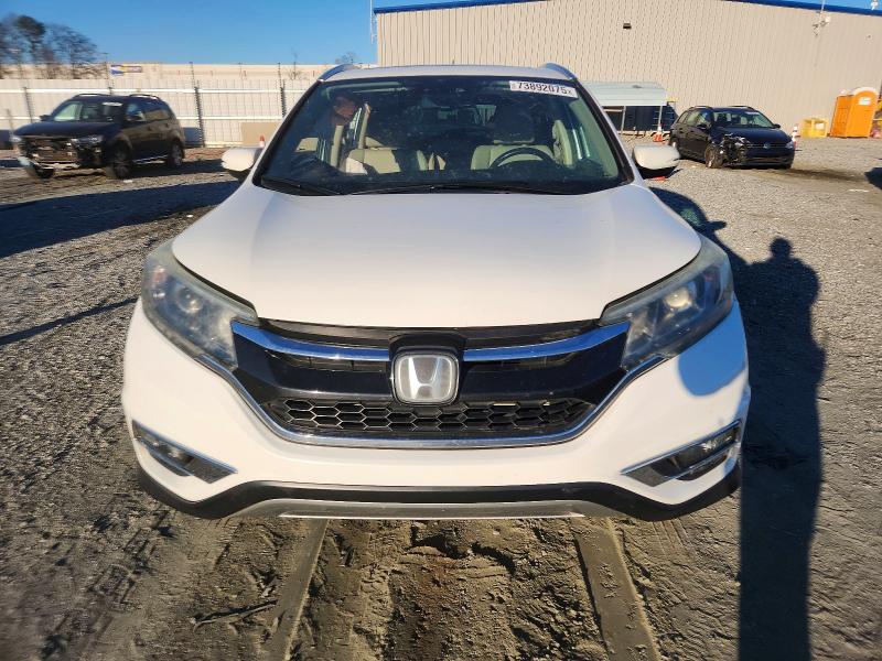 Photo 5 from auction – 2015 HONDA CR-V TOURI with VIN 5J6RM3H94FL020446