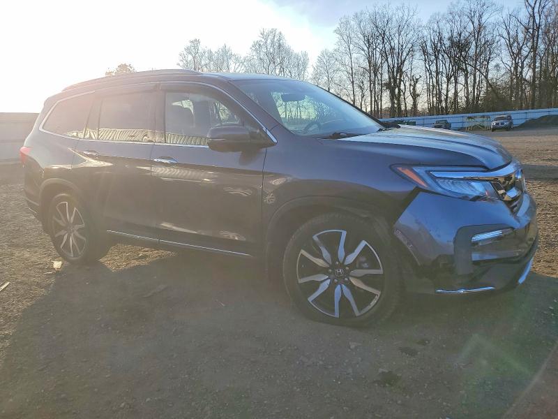 Photo 4 from auction – 2021 HONDA PILOT ELIT with VIN 5FNYF6H01MB069344