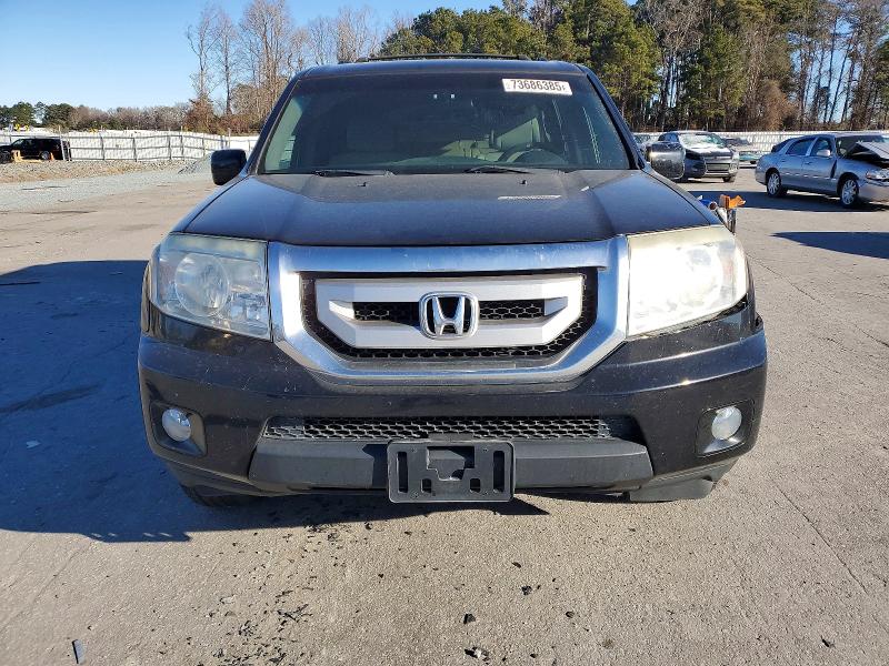 Photo 5 from auction – 2011 HONDA PILOT EX with VIN 5FNYF4H48BB105535