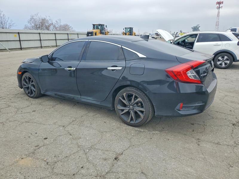 Photo 2 from auction – 2016 HONDA CIVIC TOUR with VIN 2HGFC1F90GH648491