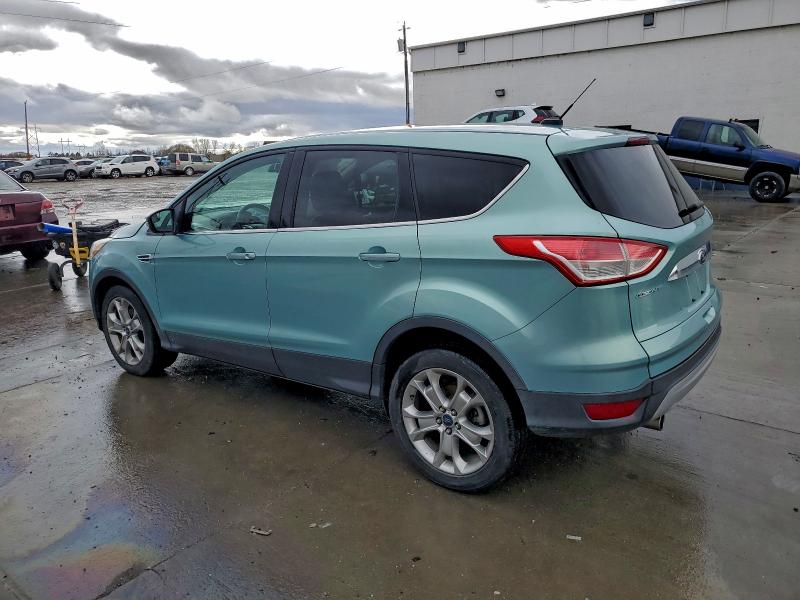 Photo 2 from auction – 2013 FORD ESCAPE SEL with VIN 1FMCU0HX8DUA74974