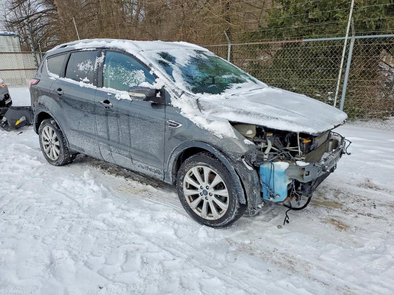 Photo 4 from auction – 2017 FORD ESCAPE TIT with VIN 1FMCU9JD7HUC08321
