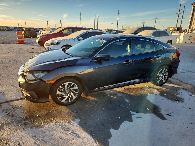 HONDA CIVIC EX 2018 with VIN 2HGFC2F77JH504402 - Photo from auction