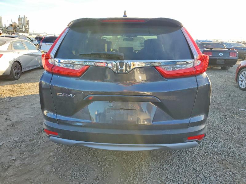 Photo 6 from auction – 2017 HONDA CR-V with VIN 7FARW1H50HE030353