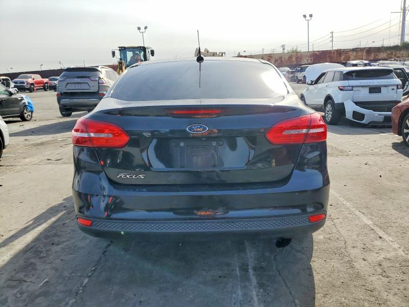 Photo 6 from auction – 2015 FORD FOCUS S with VIN 1FADP3E29FL380316
