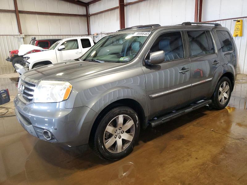 HONDA PILOT TOUR 2013 with VIN 5FNYF4H9XDB070883 - Photo from auction