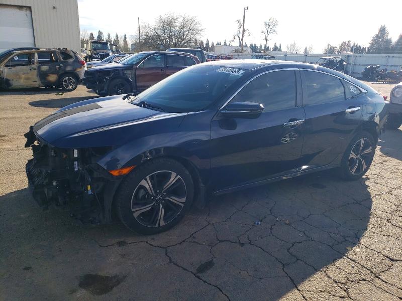 HONDA CIVIC TOUR 2016 with VIN 19XFC1F95GE216683 - Photo from auction
