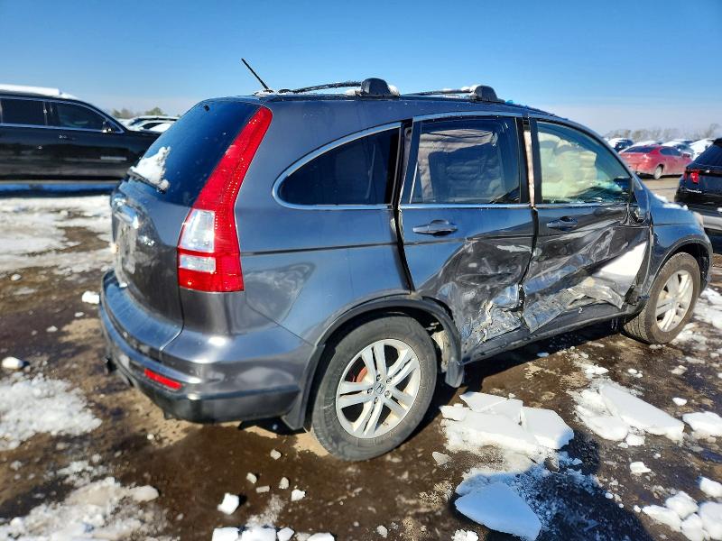 Photo 3 from auction – 2011 HONDA CR-V EXL with VIN JHLRE4H77BC004102