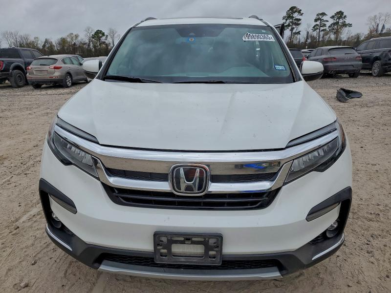 Photo 5 from auction – 2021 HONDA PILOT TOUR with VIN 5FNYF5H63MB035808